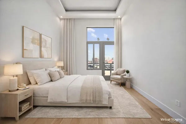 a bedroom with a bed and a table