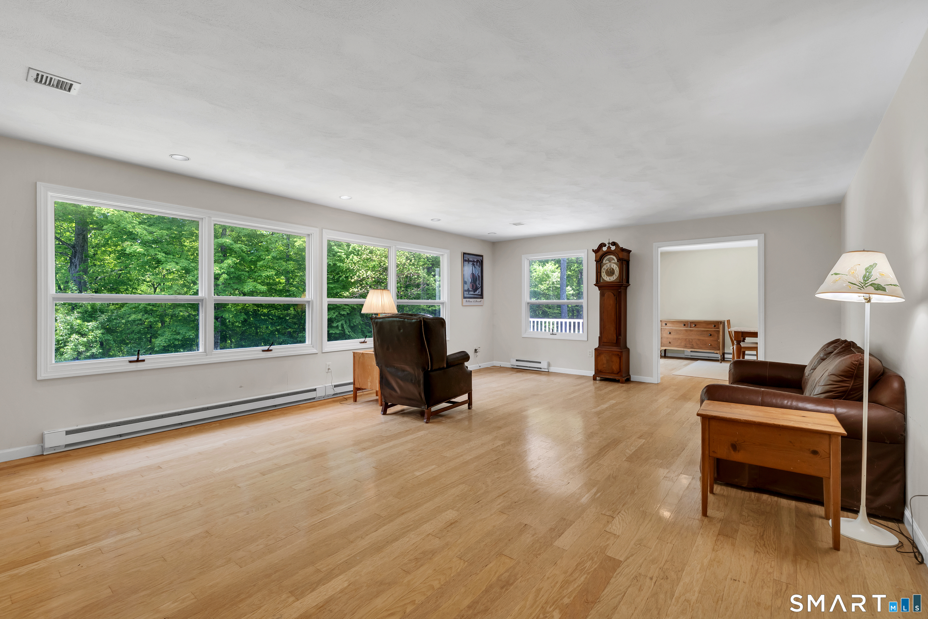 30 Maltbie Road Newtown, CT 06470 - Photo 21 of 40 a living room with furniture and a large window