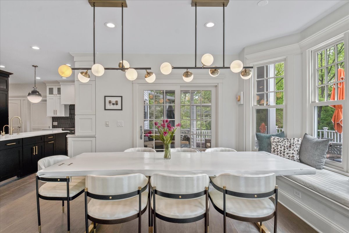1423 Northwoods Road Deerfield, IL 60015 - Photo 11 of 39 a view of a dining room and a table and chairs
