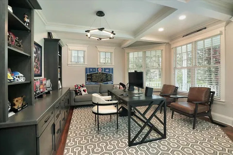 a spacious bedroom with a bed and window