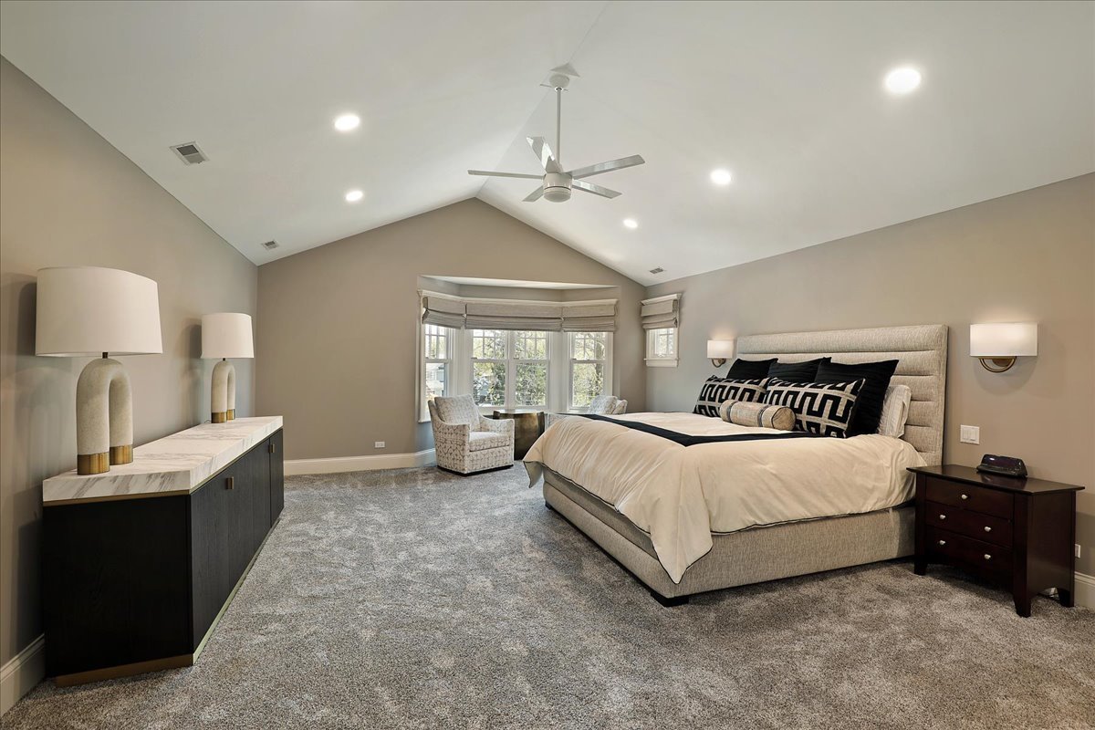 1423 Northwoods Road Deerfield, IL 60015 - Photo 16 of 39 a spacious bedroom with a bed and window