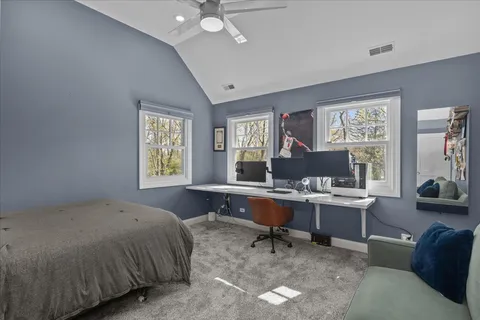 a bathroom with a sink toilet a mirror and shower