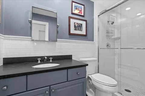 a living room with furniture flat screen tv and a fireplace