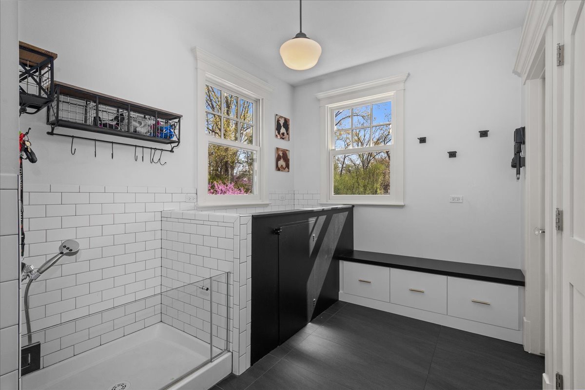 1423 Northwoods Road Deerfield, IL 60015 - Photo 27 of 39 a bathroom with a shower and a sink