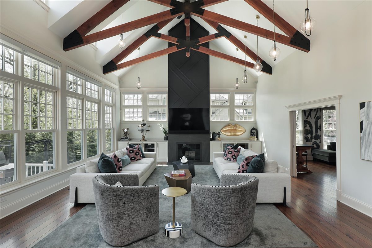1423 Northwoods Road Deerfield, IL 60015 - Photo 3 of 39 a living room with fireplace furniture and a large window
