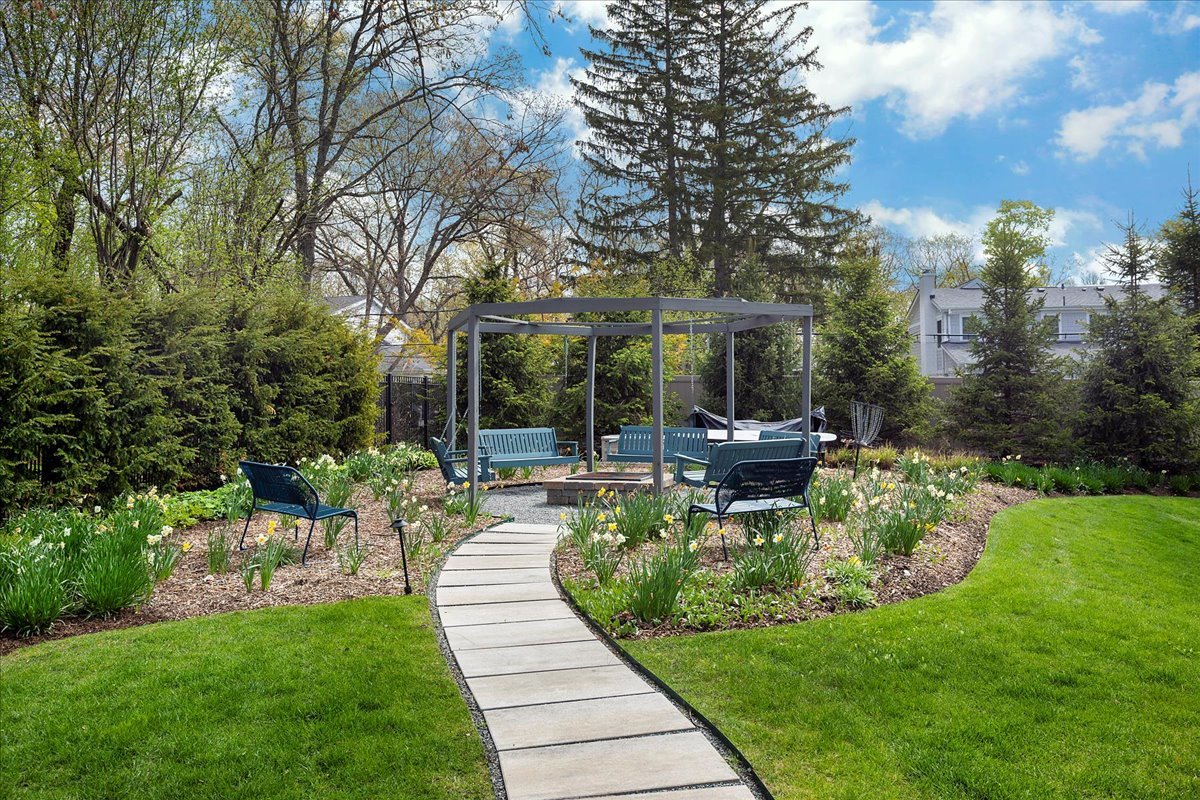 1423 Northwoods Road Deerfield, IL 60015 - Photo 34 of 39 a view of a chair and table in backyard of the house