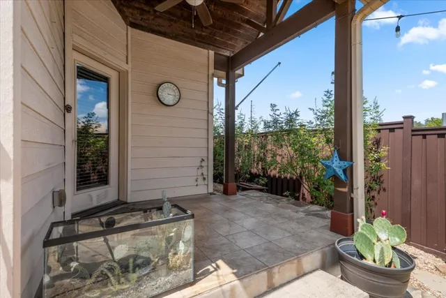 a view of a porch with seating space