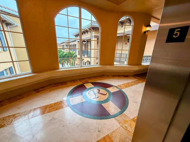 a bathroom with a sink a mirror and a window