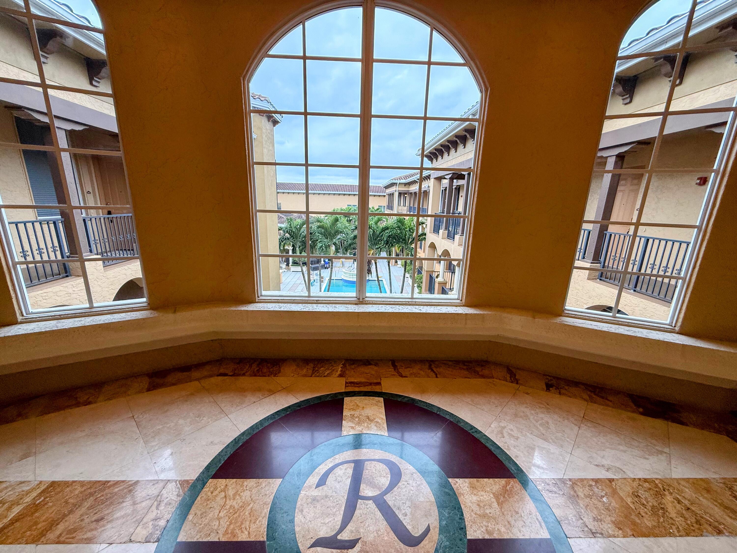 20 Orange Avenue, Unit 9 Fort Pierce, FL 34950 - Photo 13 of 92 a view of livingroom with furniture and window