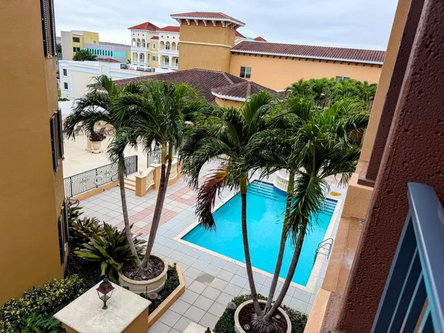 a kitchen with a refrigerator and a stove