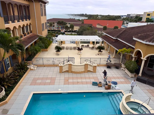 a kitchen with stainless steel appliances granite countertop a stove refrigerator and a refrigerator