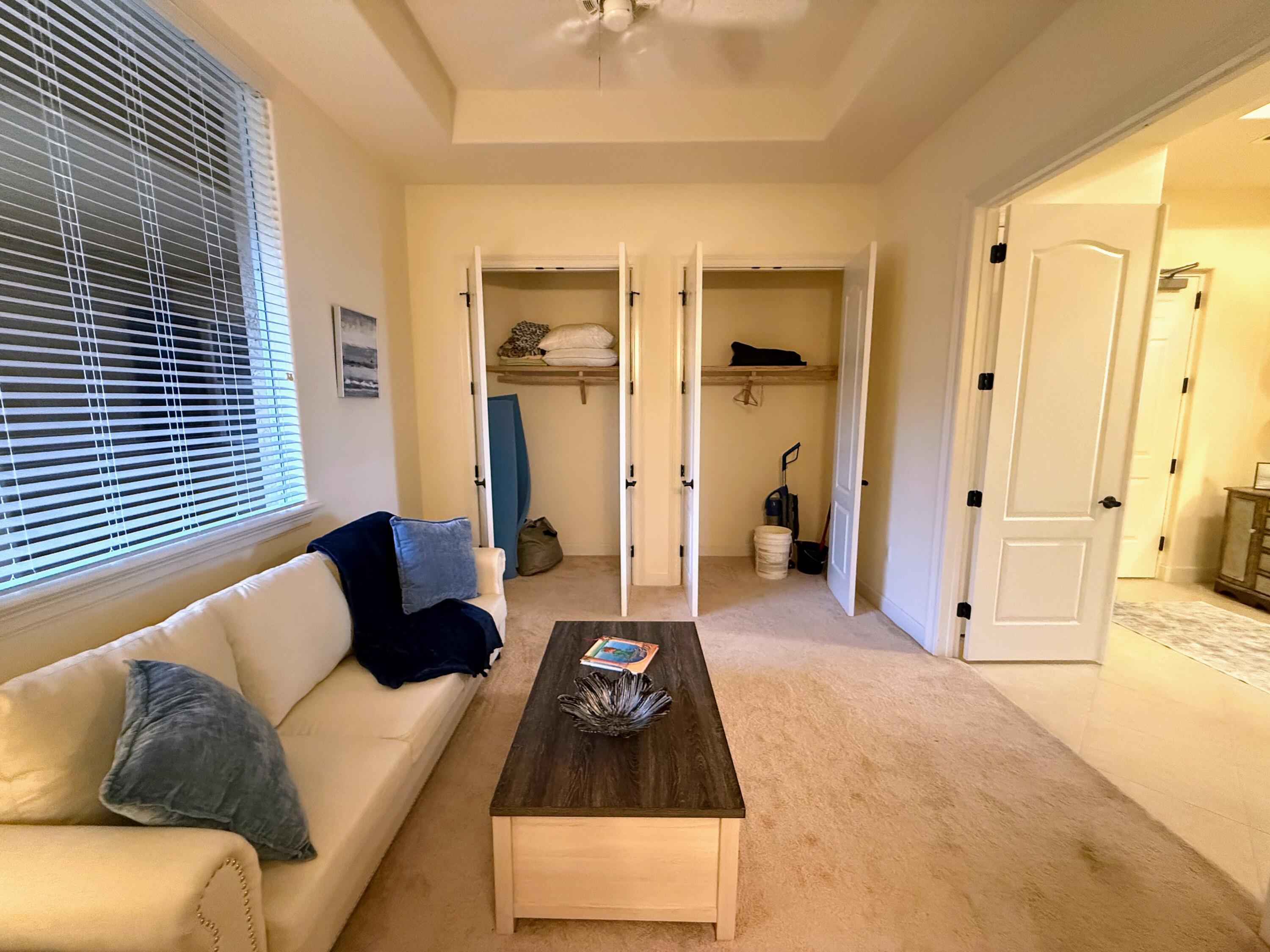 20 Orange Avenue, Unit 9 Fort Pierce, FL 34950 - Photo 47 of 92 a living room with furniture and a window
