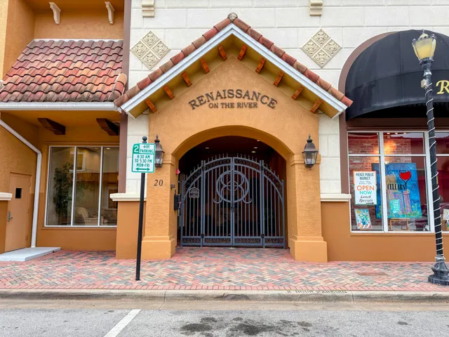 a outdoor living space with furniture and a flat screen tv