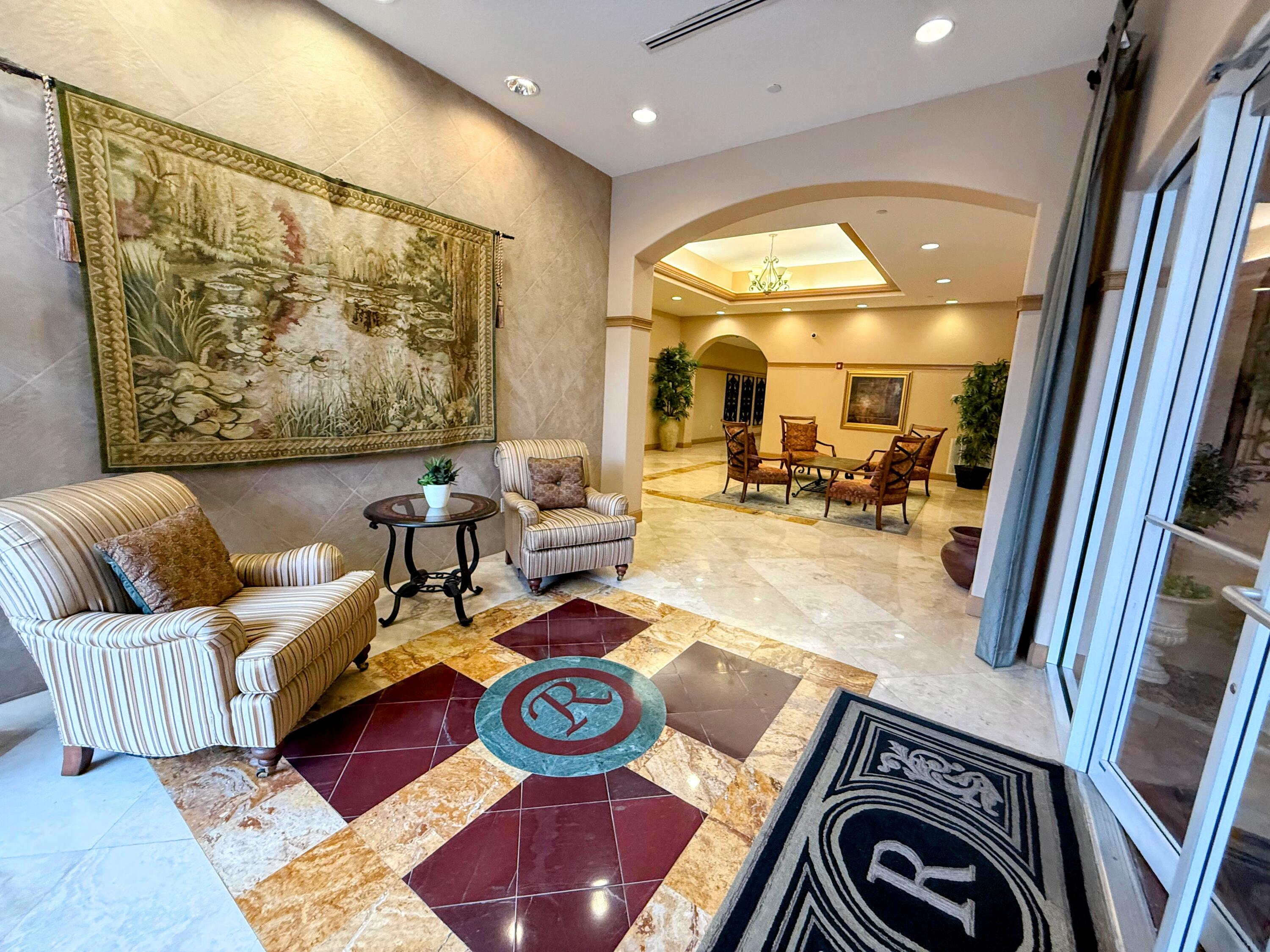 20 Orange Avenue, Unit 9 Fort Pierce, FL 34950 - Photo 10 of 92 a living room with furniture and a large window