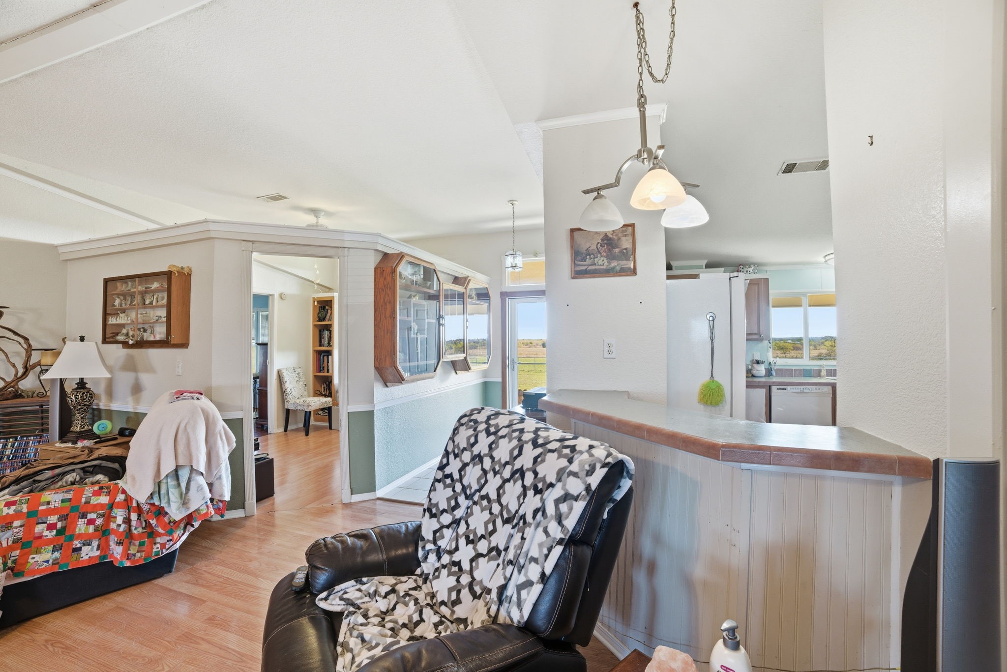 2124 Hackberry Road Salado, TX 76571 - Photo 19 of 27 a living room with furniture chandelier and a chandelier