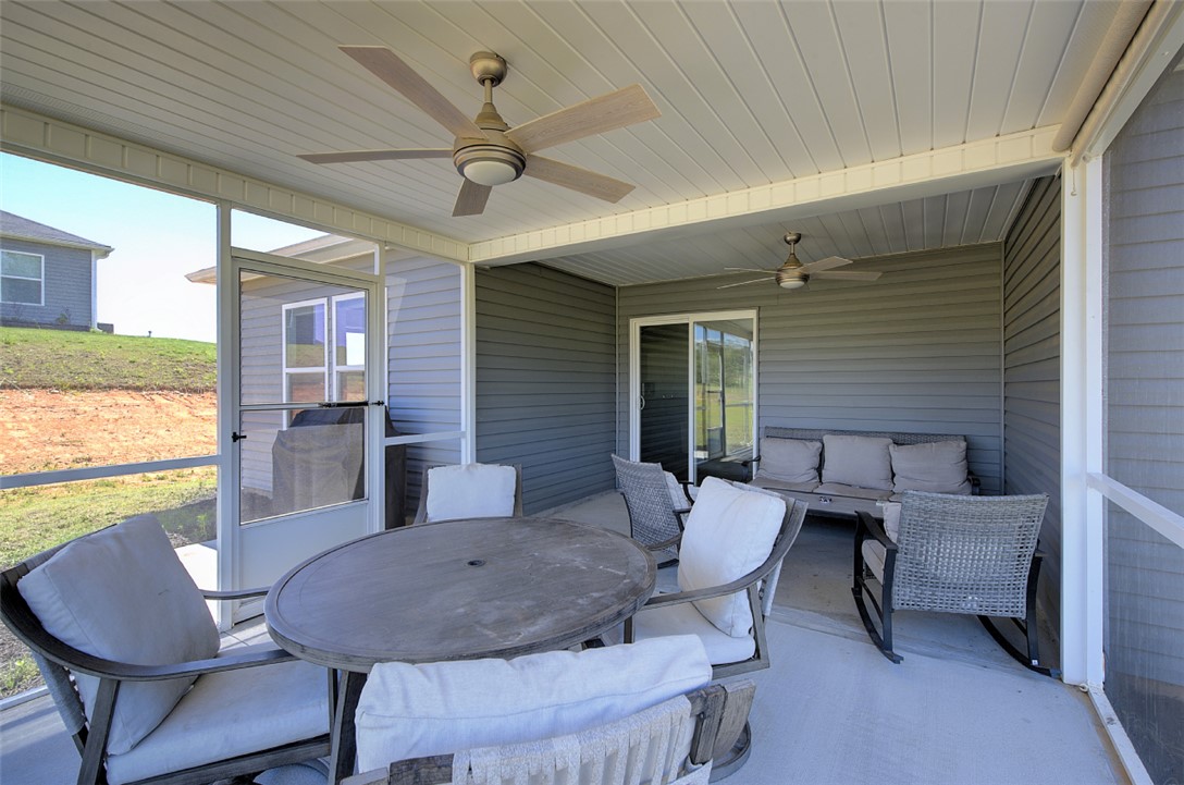408 Chadwick Lane Walhalla, SC 29691 - Photo 29 of 44 Enjoy outdoor living with a screened porch and ample space for relaxation.