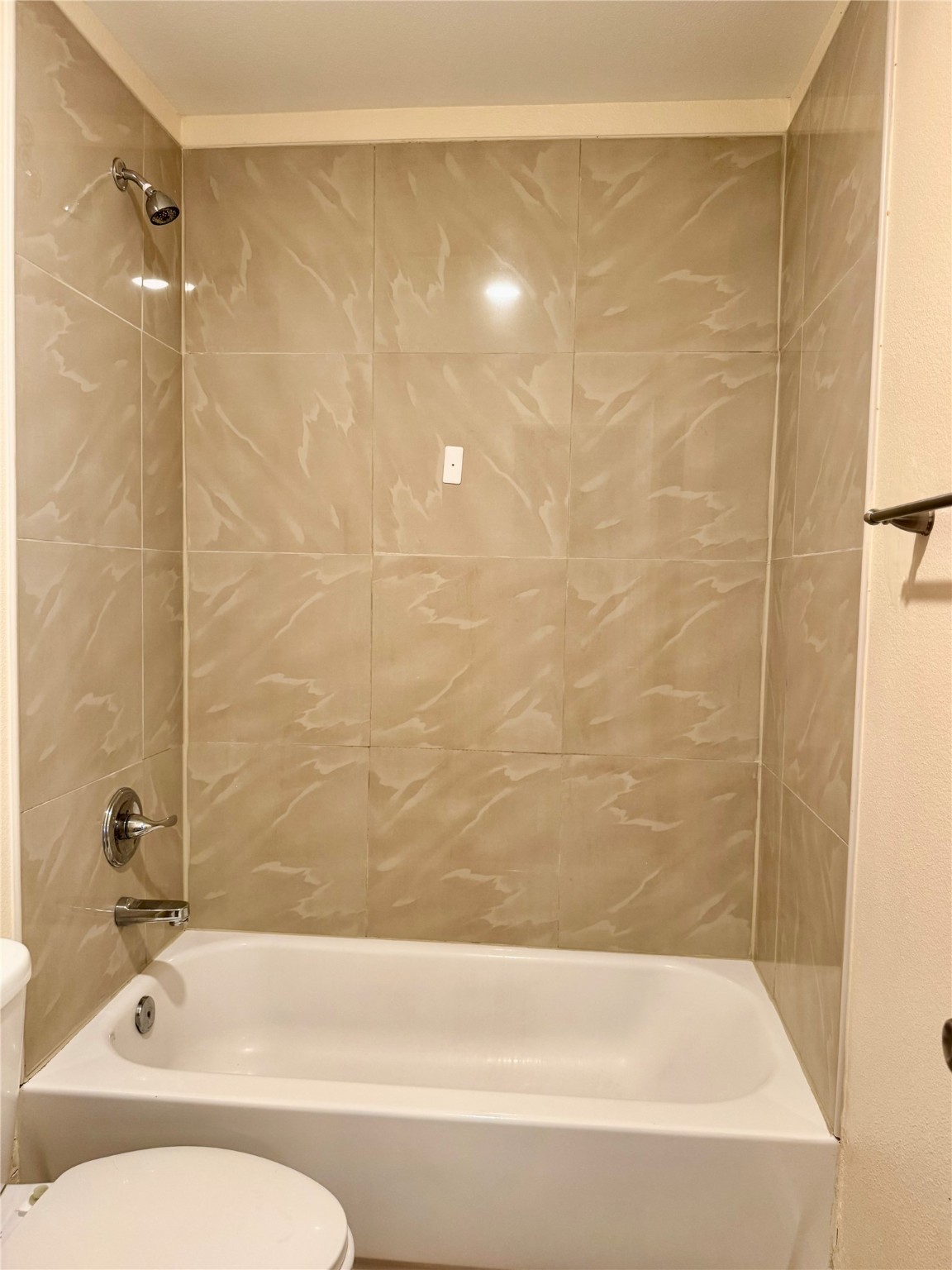 711 Hahlo Street Houston, TX 77020 - Photo 13 of 13 a bathroom with a bathtub and shower