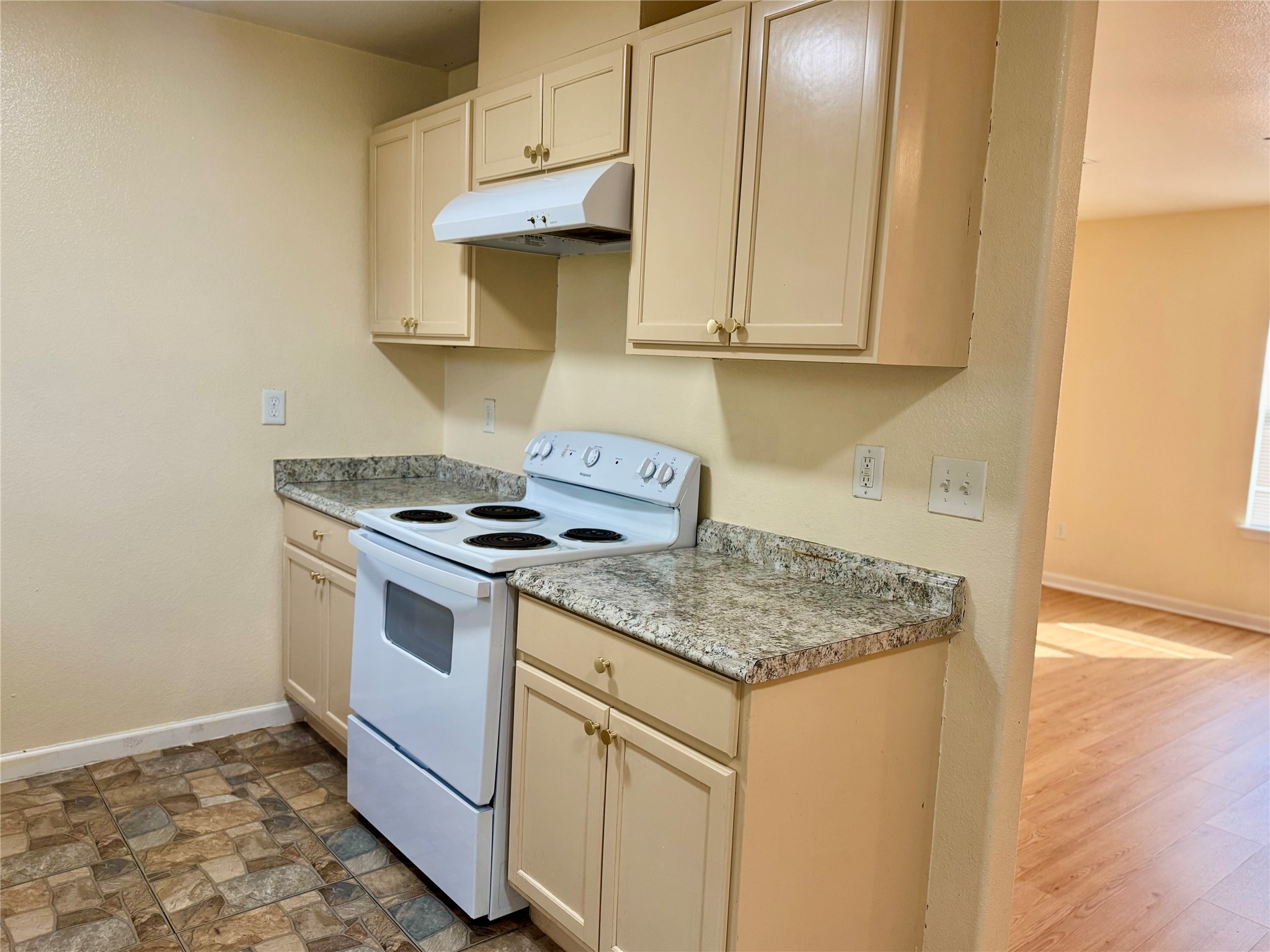 711 Hahlo Street Houston, TX 77020 - Photo 6 of 13 a kitchen with stainless steel appliances granite countertop a sink stove and cabinets
