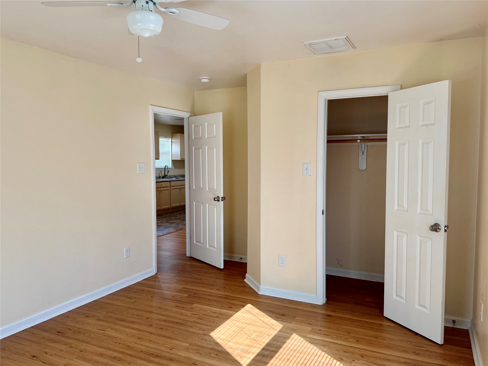 711 Hahlo Street Houston, TX 77020 - Photo 10 of 13 an empty room with wooden floor and closet