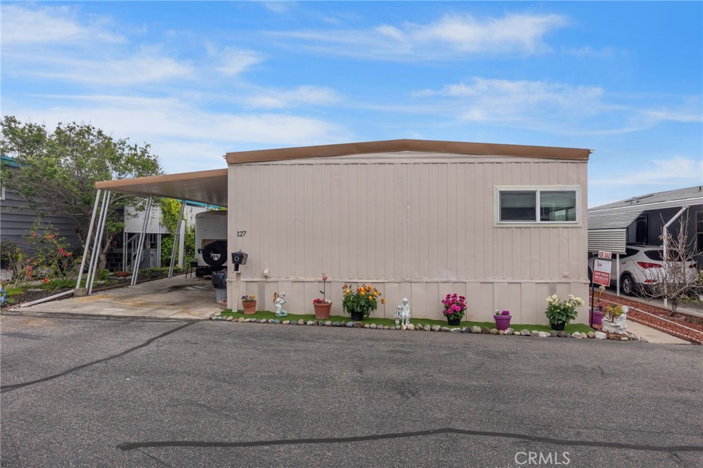 127 Brookside Lane Oceanside, CA 92056 - Photo 2 of 30 a view of a house with backyard