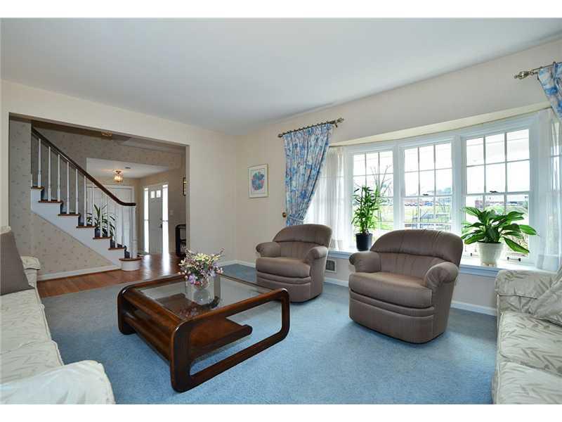615 Miranda Road Upper St. Clair, PA 15241 - Photo 2 of 22 Living Room. Sun-filled living room with oversized bay window. Wood floors throughout both 1st & 2nd floors, under carpeting.