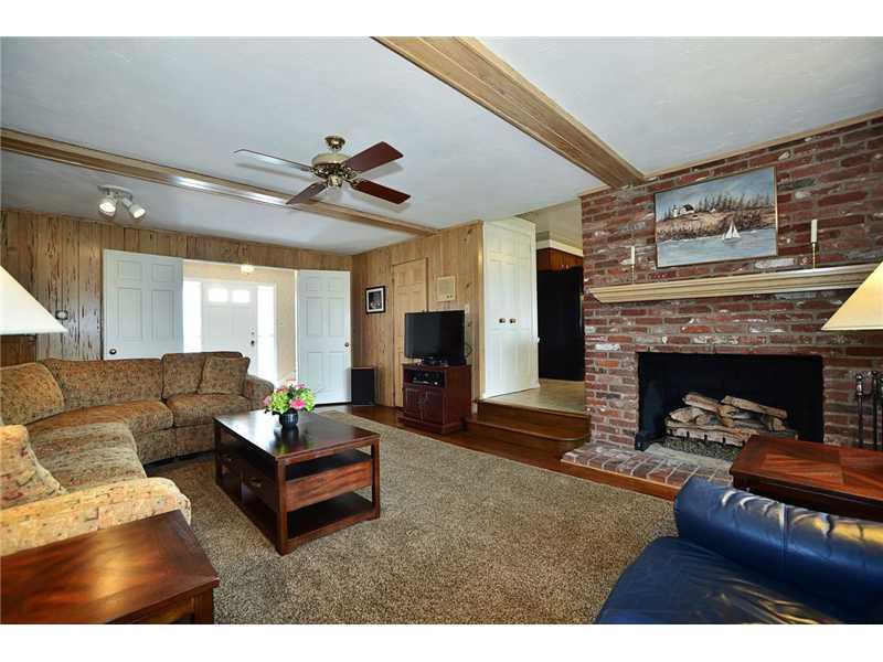 615 Miranda Road Upper St. Clair, PA 15241 - Photo 5 of 22 Family Room. Warm, inviting fireplace adjacent to entrance to kitchen.