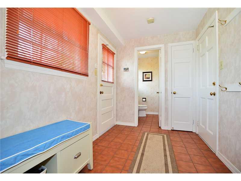 615 Miranda Road Upper St. Clair, PA 15241 - Photo 9 of 22 Partial Bath. Convenient mud room (with adjacent powder room) connects the integral garage to the family room and the rear yard & patio. Powder room is in rear of photo.