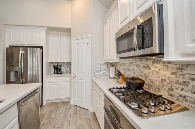 a bed room with a bed and a window