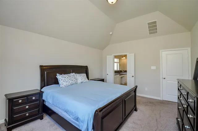 a bedroom with toys and a wooden floor