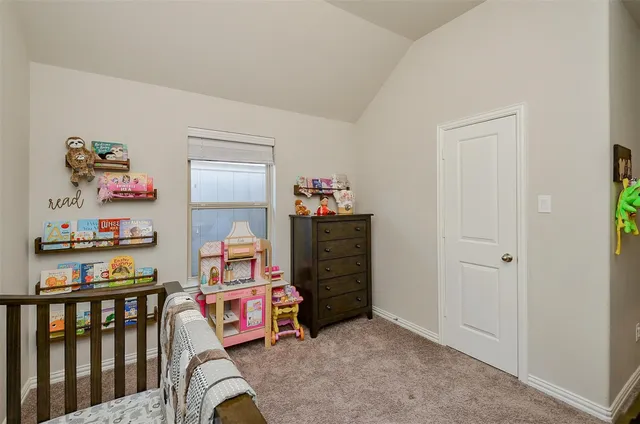 a view of workspace with cabinets