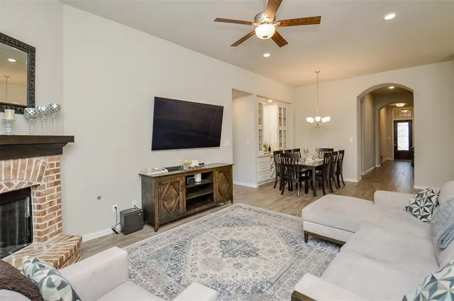 a view of a dining room with furniture and window
