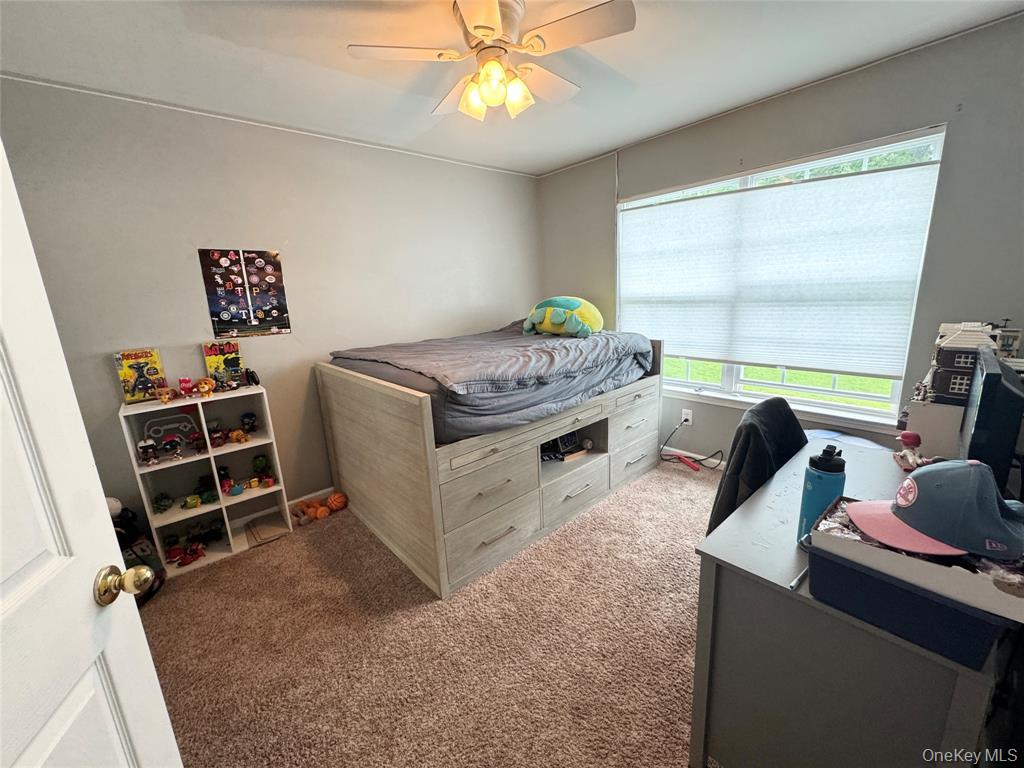 5 Case Court Monroe, NY 10950 - Photo 17 of 35 a bedroom with furniture and a window