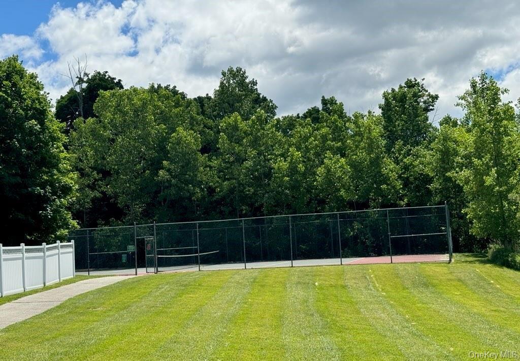 5 Case Court Monroe, NY 10950 - Photo 28 of 35 a view of a tennis court with a small yard