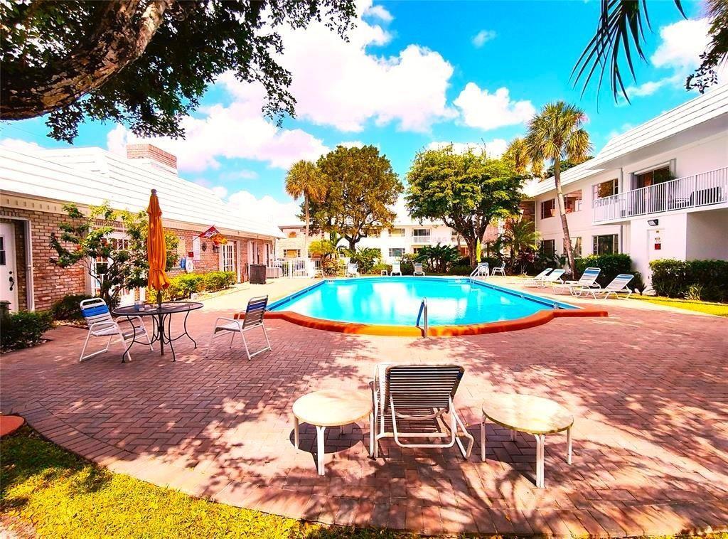 a view of outdoor space with seating area