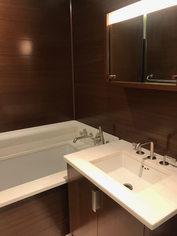 60 Riverside Boulevard, Unit 615 Manhattan, NY 10069 - Photo 10 of 15 a bathroom with a sink and a mirror