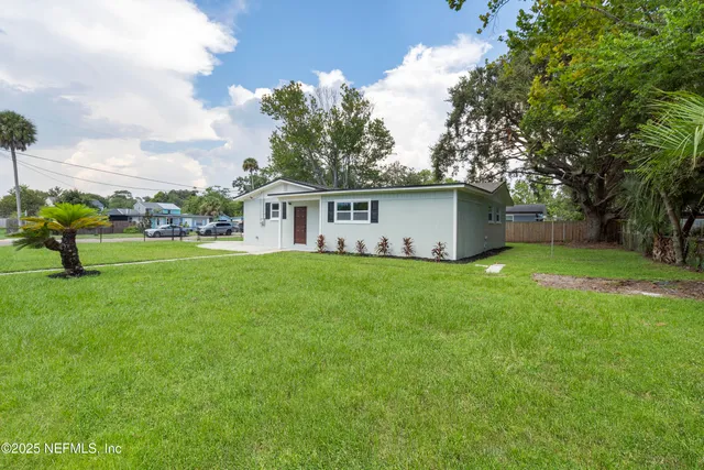 a view of a backyard with a garden