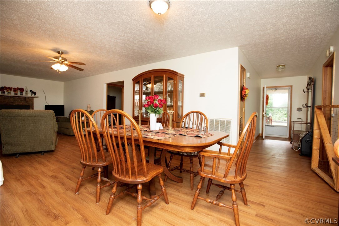 533 Schultz Ml Road Meherrin, VA 23954 - Photo 15 of 50 a view of a dining room with furniture and wooden floor