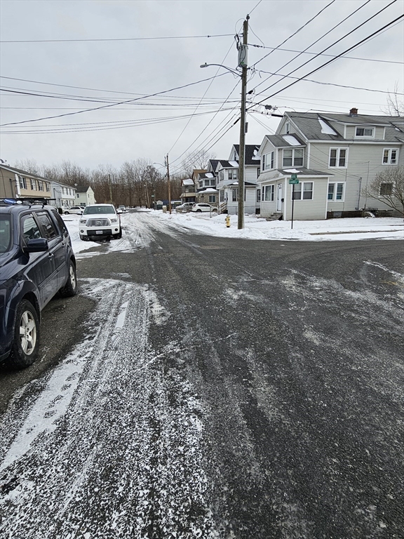 176 Corthell Street, Unit 1 Springfield, MA 01151 - Photo 25 of 28 a view of a cars park in a parking lot