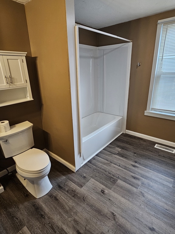 176 Corthell Street, Unit 1 Springfield, MA 01151 - Photo 4 of 28 a bathroom with a toilet and a shower