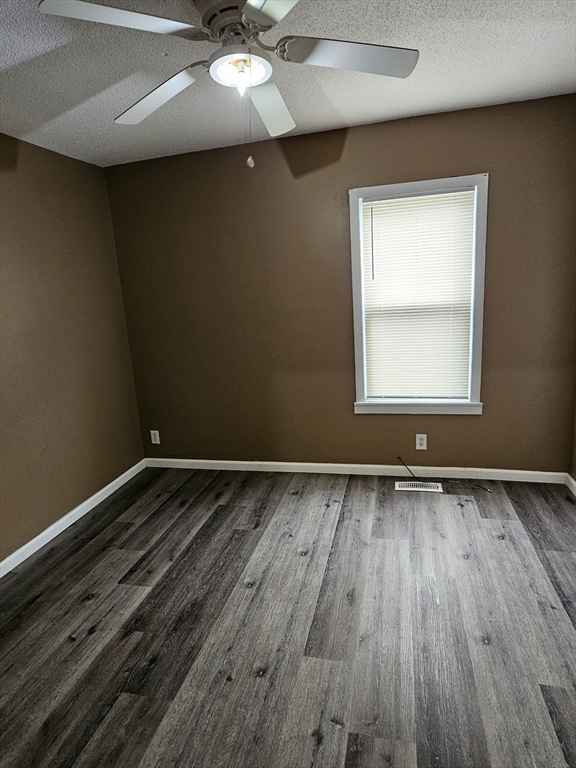 176 Corthell Street, Unit 1 Springfield, MA 01151 - Photo 6 of 28 wooden floor in an empty room