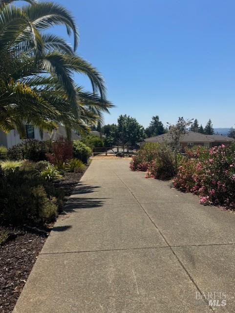 3881 Sage Hill Place Santa Rosa, CA 95404 - Photo 2 of 6 a backyard of a house with lots of green space