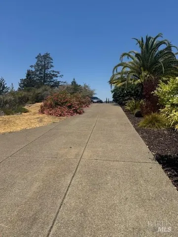 a view of terrace with yard