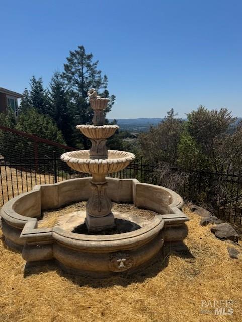 3881 Sage Hill Place Santa Rosa, CA 95404 - Photo 5 of 6 a view of a fountain is sitting in the middle of a lake