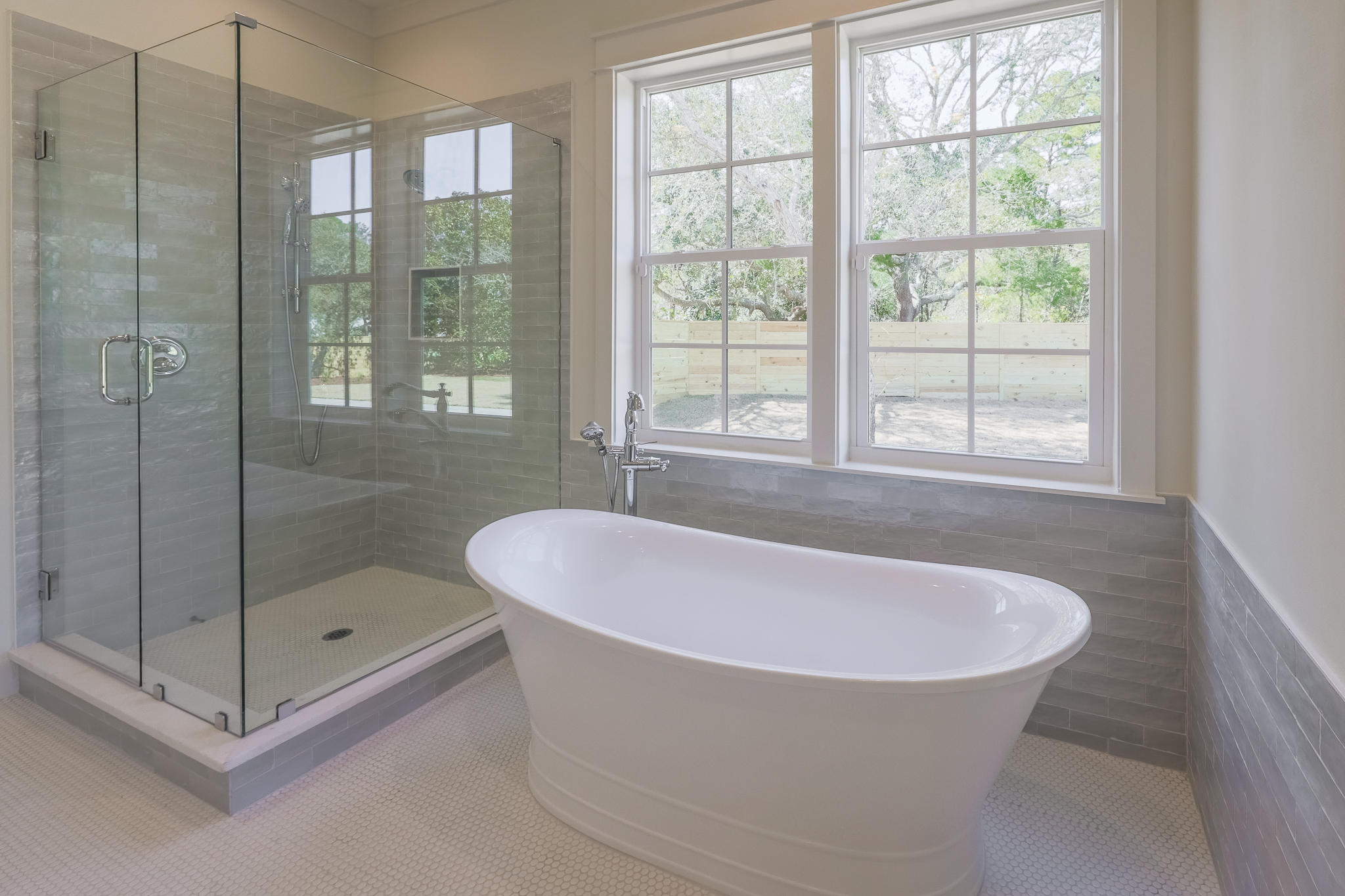 65 Horseshoe Circle Miramar Beach, FL 32550 - Photo 21 of 41 a white bath tub sitting next to a shower