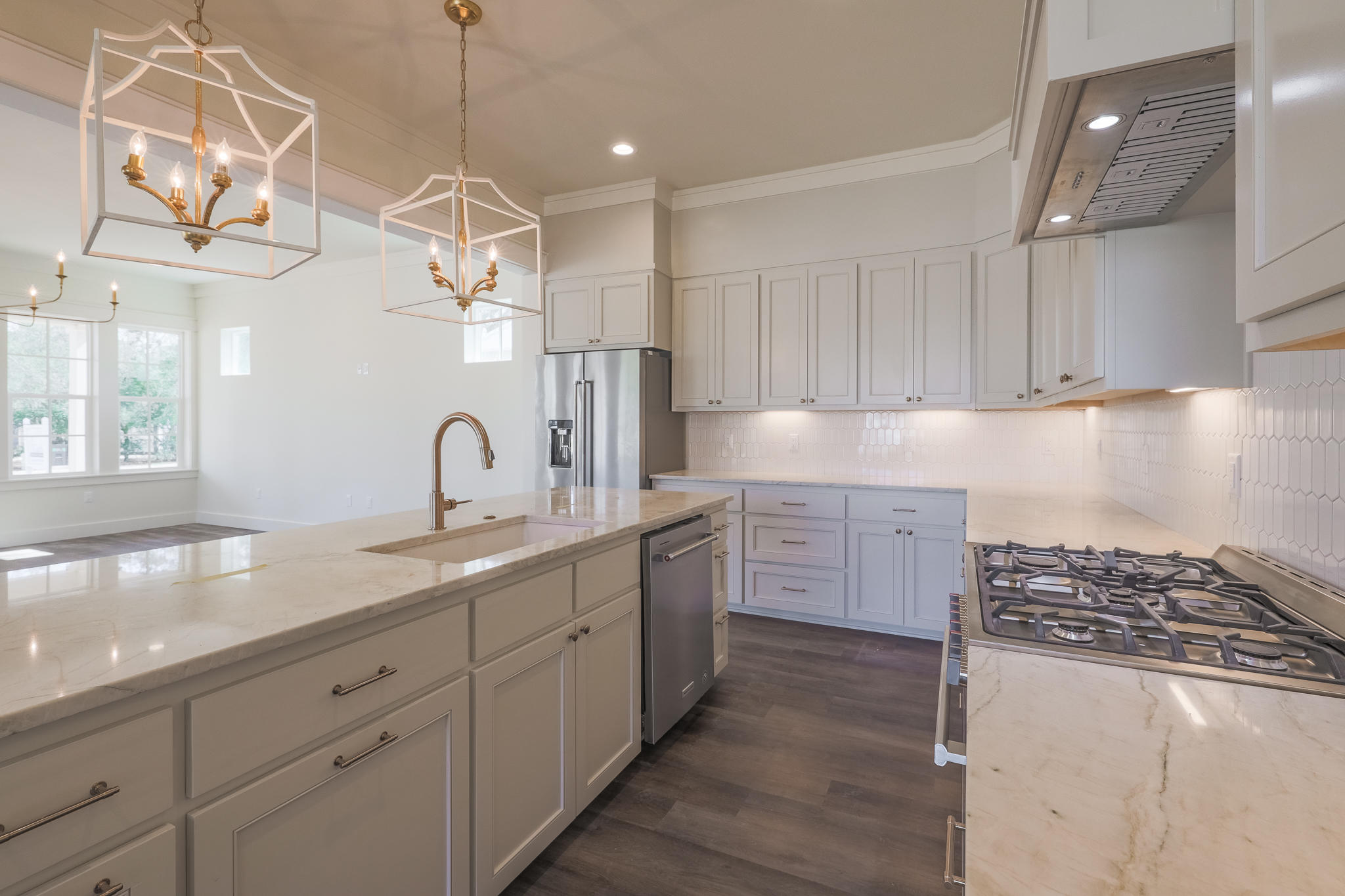 65 Horseshoe Circle Miramar Beach, FL 32550 - Photo 5 of 41 a kitchen with sink stove and cabinets