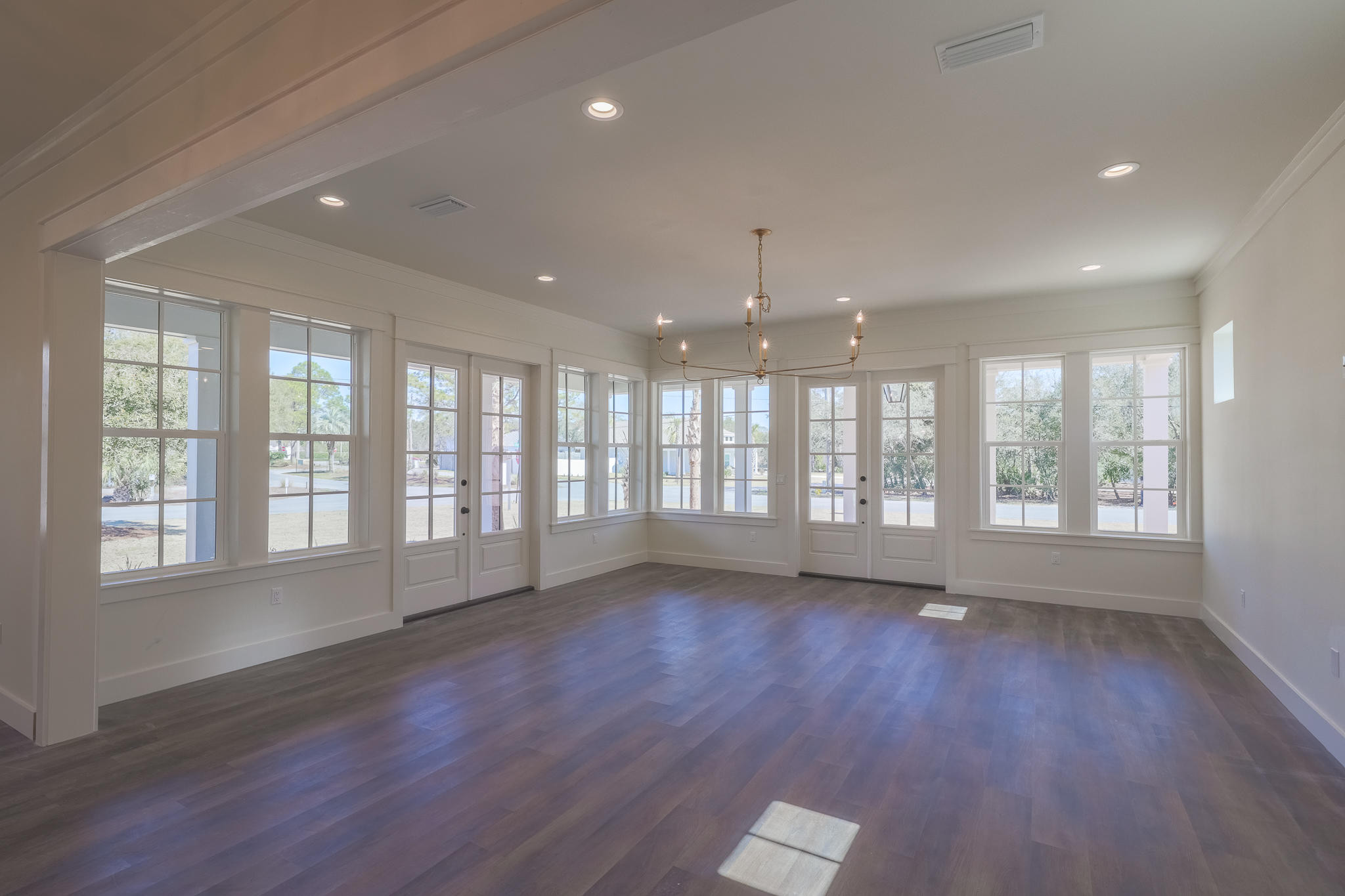 65 Horseshoe Circle Miramar Beach, FL 32550 - Photo 8 of 41 a view of an empty room with wooden floor and a window
