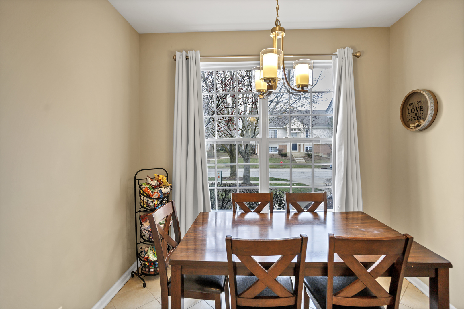 848 Pheasant Trail St. Charles, IL 60174 - Photo 12 of 30 a view of a dining room with furniture and chandelier