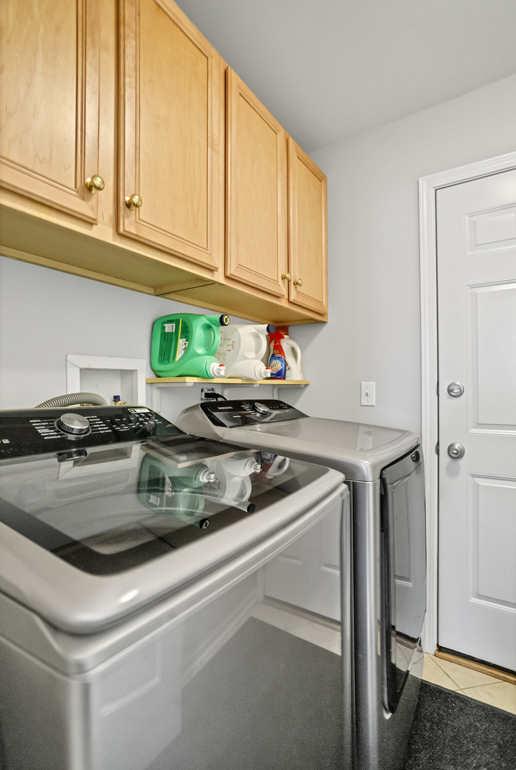 848 Pheasant Trail St. Charles, IL 60174 - Photo 13 of 30 a kitchen with stainless steel appliances granite countertop a sink a stove and a granite counter tops