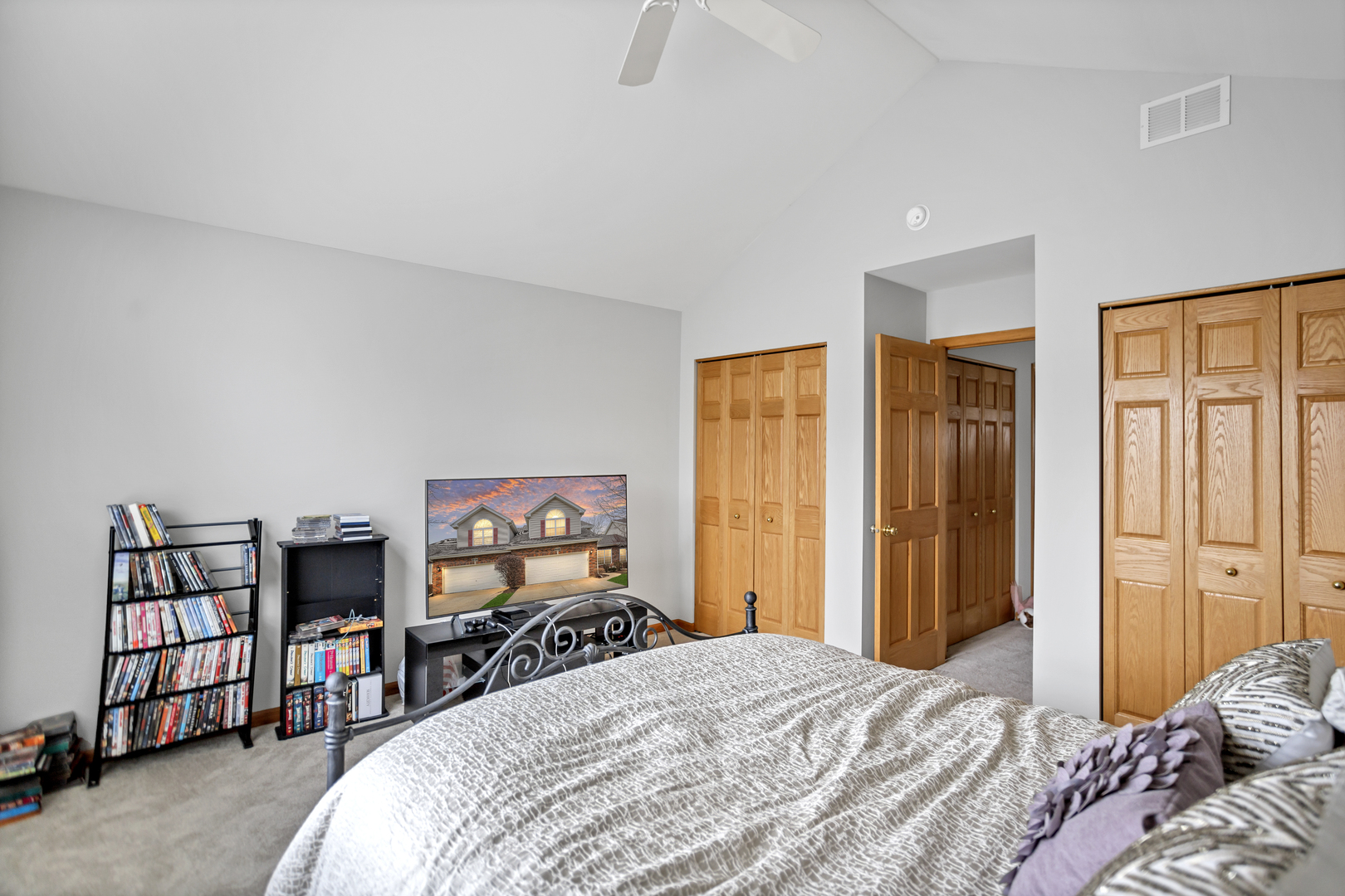 848 Pheasant Trail St. Charles, IL 60174 - Photo 23 of 30 a bedroom with a bed and a dresser
