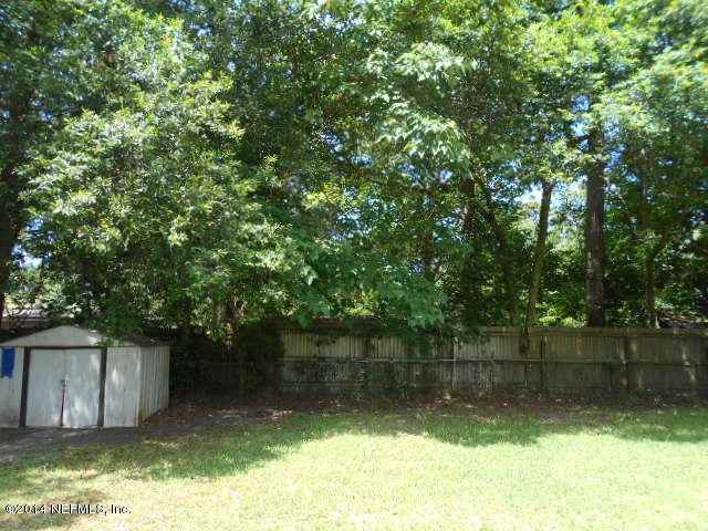 2916 Kent Road Jacksonville, FL 32216 - Photo 15 of 15 a backyard of a house